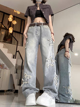 Cerulis – Schlaghose aus Denim mit Wickeldesign und Sternen